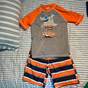 Gymboree swim trunks and rash guard size 8